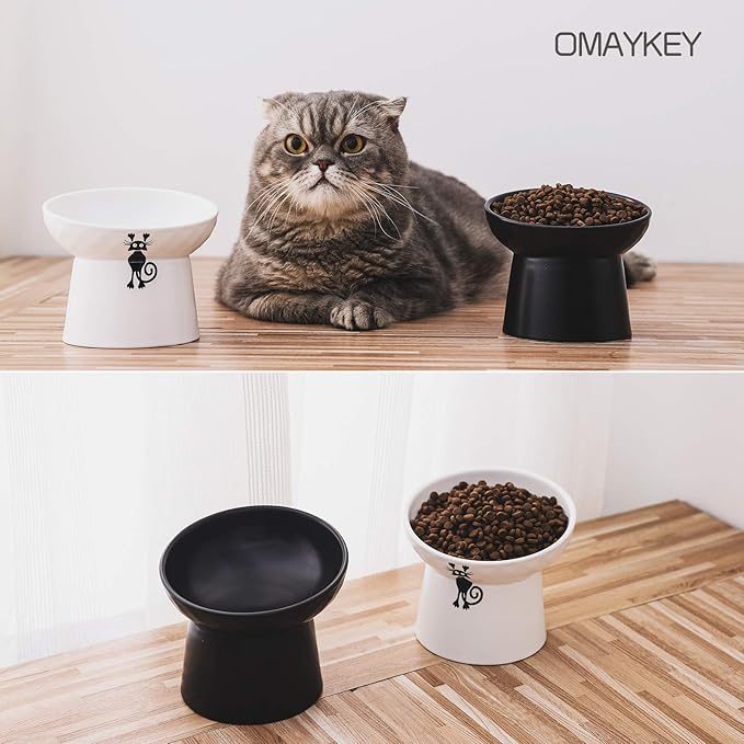 OMAYKEY Ceramic Raised Cat Bowls, Tilted Elevated Cat Food and Water Bowl Set, Porcelain Stress Free Pet Feeder Dish for Cats and Small Dogs, Dishwasher and Microwave Safe - Set of 2, White & Black