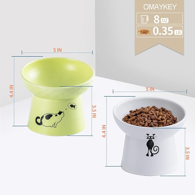 OMAYKEY Ceramic Raised Cat Bowls, Tilted Elevated Cat Food Water Bowl Set, Porcelain Stress Free Pet Feeder Dish for Cats and Small Dogs, Dishwasher and Microwave Safe - White & Fruit Green, Set of 2
