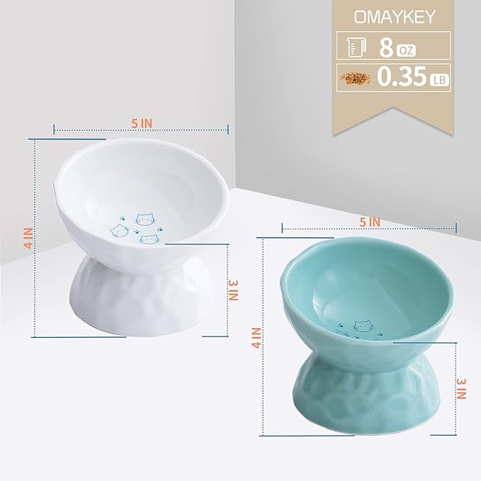 OMAYKEY Ceramic Raised Cat Bowls, Tilted Elevated Cat Food and Water Bowl Set, Porcelain Stress Free Pet Feeder Dish for Cats and Small Dogs, Dishwasher and Microwave Safe, White & Green, Set of 2