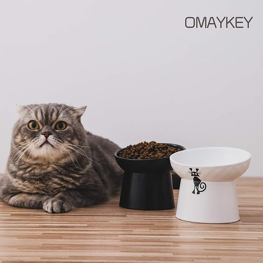 OMAYKEY Ceramic Raised Cat Bowls, Tilted Elevated Cat Food and Water Bowl Set, Porcelain Stress Free Pet Feeder Dish for Cats and Small Dogs, Dishwasher and Microwave Safe - Set of 2, White & Black