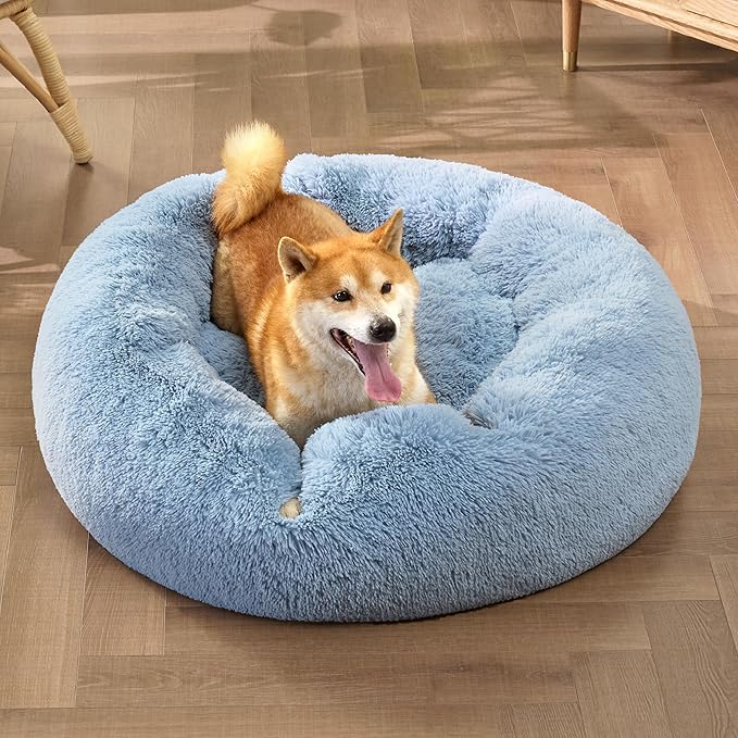 Bedsure Calming Dog Bed for Medium Dogs - Donut Washable Medium Pet Bed, Anti-Slip Round Fluffy Plush Faux Fur Cat Bed, Fits up to 45 lbs Pets, Light Blue, 30 inches