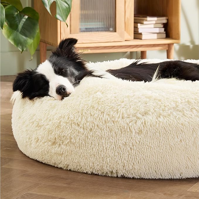 Bedsure Calming Dog Bed for Large Dogs - Donut Washable Large Pet Bed, Anti-Slip Round Fluffy Plush Faux Fur Dog Bed, Fits up to 80 lbs Pets, Cream, 36 inches